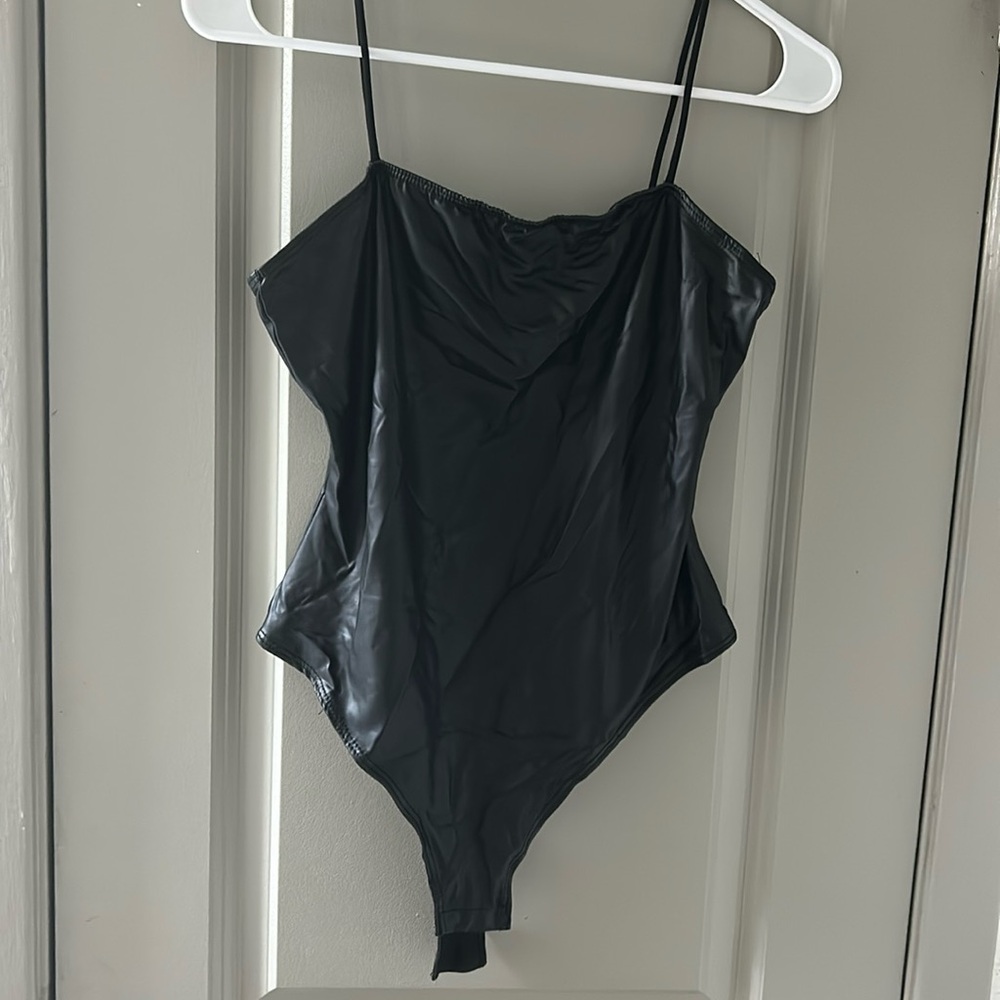Beautiful Girl Bodysuit Size Mediam Color Black.